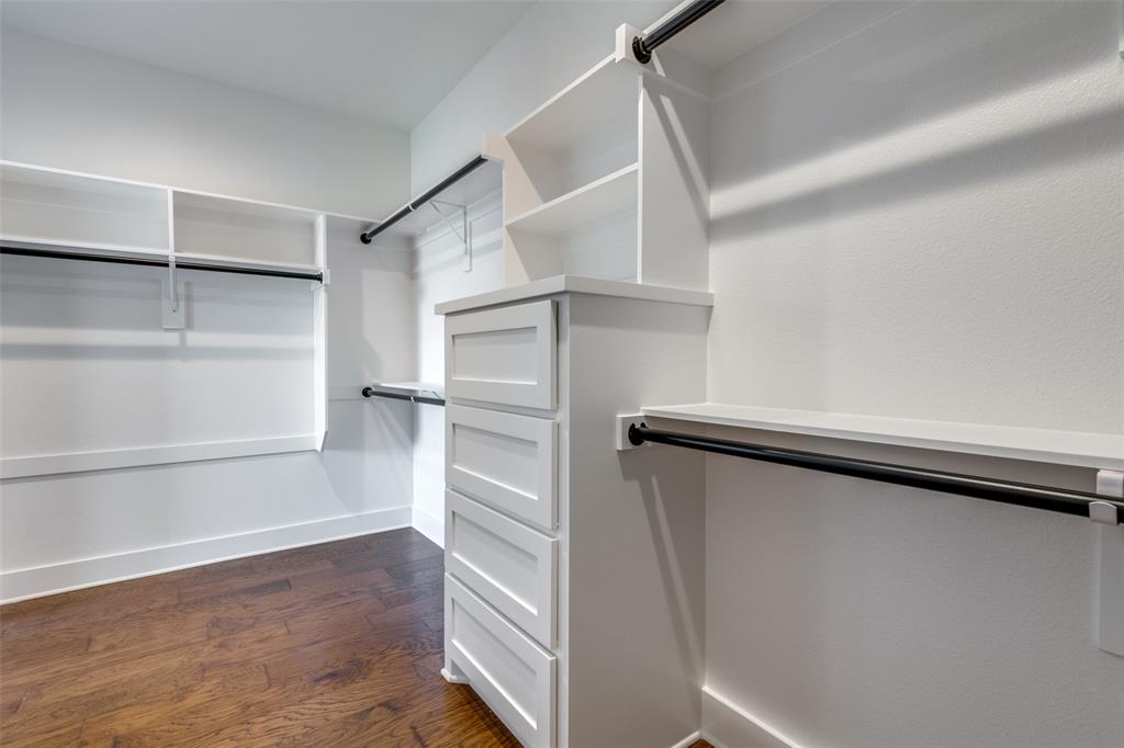 820 Evergreen Way Nevada, TX 75173 - Photo 21 of 37 a view of walk in closet with empty racks