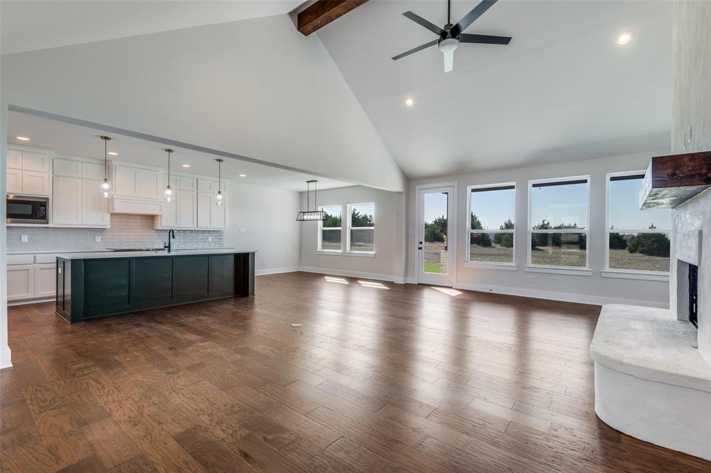 820 Evergreen Way Nevada, TX 75173 - Photo 5 of 37 a view of a kitchen with a sink and a large window