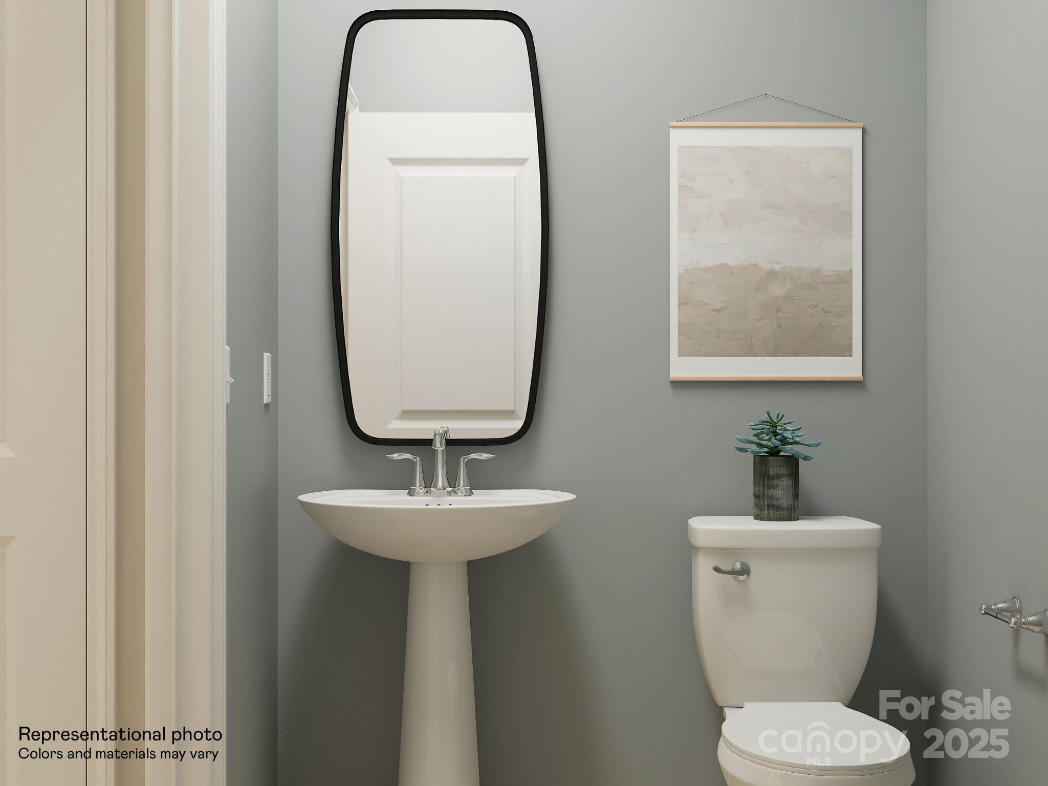 4262 Skyboat Circle Fort Mill, SC 29715 - Photo 13 of 44 a bathroom with a toilet sink and mirror