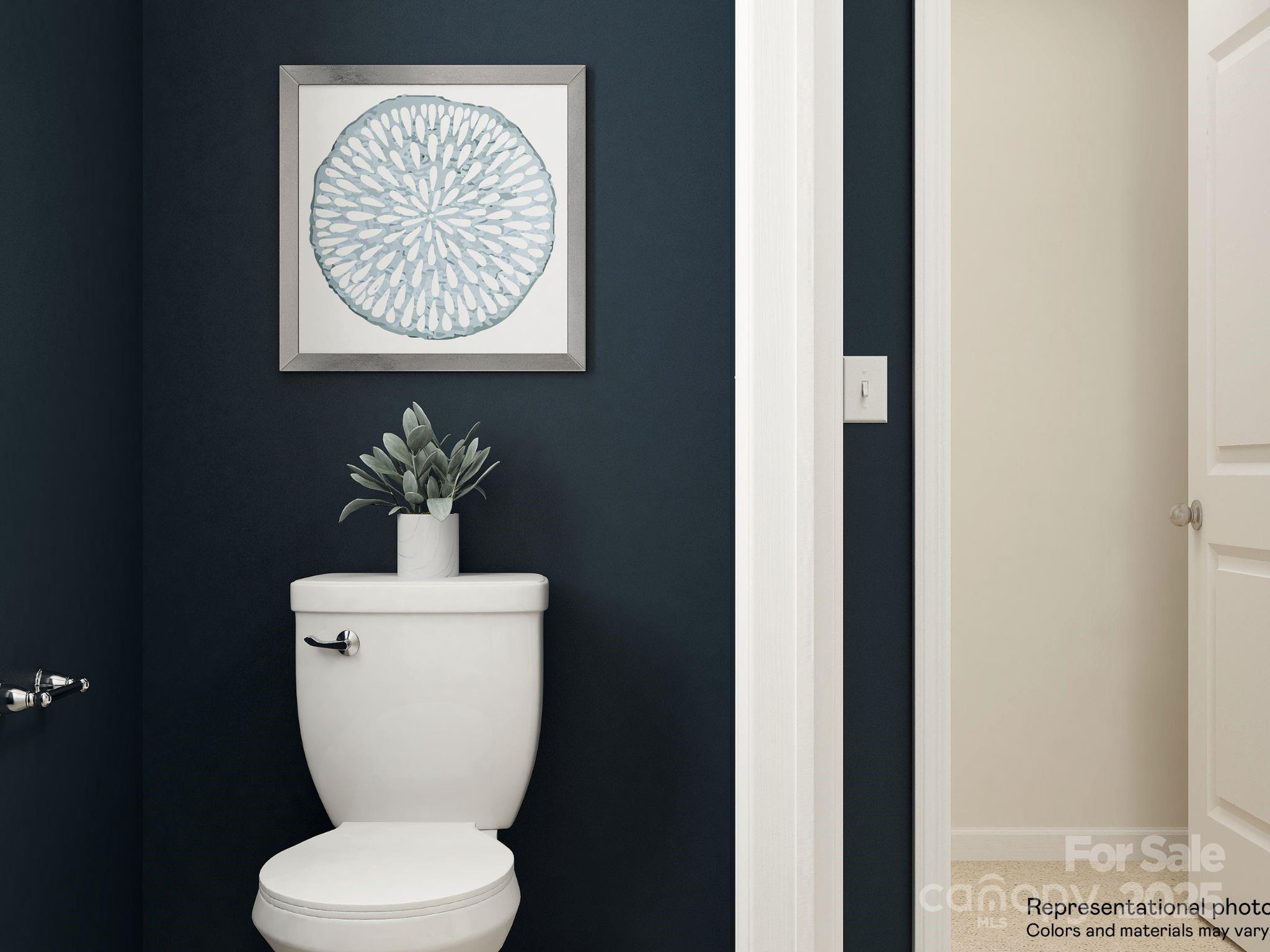 4262 Skyboat Circle Fort Mill, SC 29715 - Photo 34 of 44 a white toilet sitting next to a bathroom sink