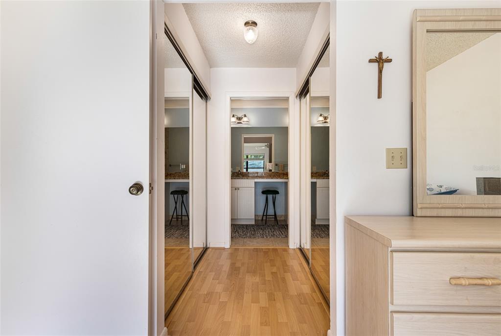 3041 Matecumbe Key Road, Unit 4 Punta Gorda, FL 33955 - Photo 14 of 33 a view of a hallway with wooden floor and staircase