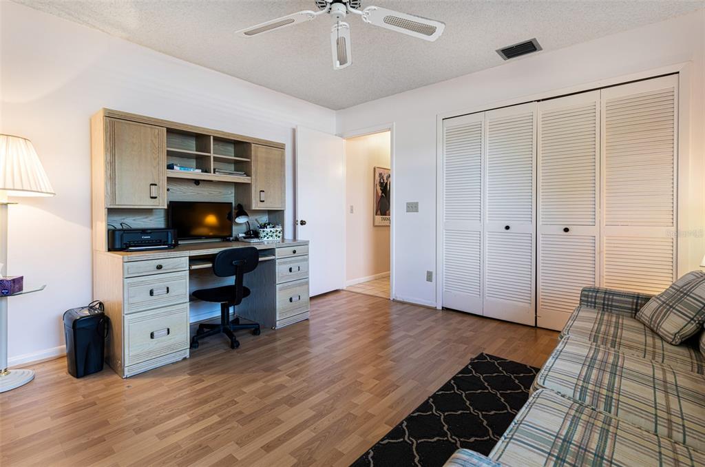3041 Matecumbe Key Road, Unit 4 Punta Gorda, FL 33955 - Photo 18 of 33 a view of workspace with furniture and wooden floor