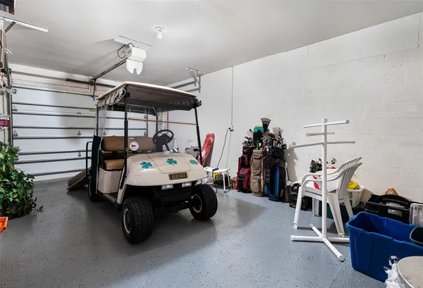 a bed room with furniture and gym equipment