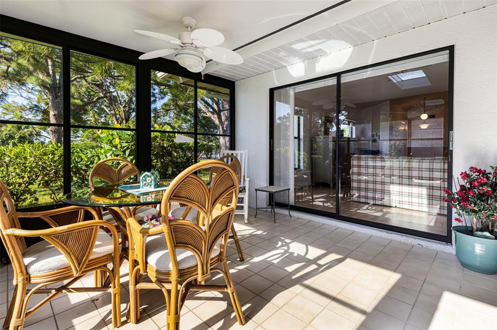 3041 Matecumbe Key Road, Unit 4 Punta Gorda, FL 33955 - Photo 30 of 33 a view of a dining room with furniture window and outside view