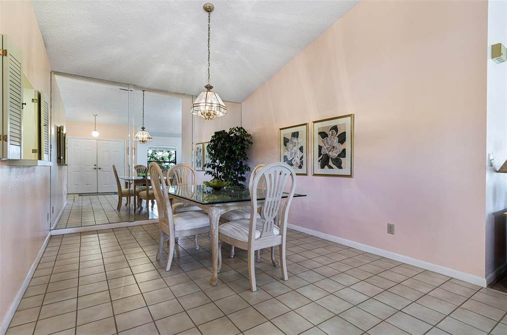 3041 Matecumbe Key Road, Unit 4 Punta Gorda, FL 33955 - Photo 9 of 33 a dining room with furniture and window