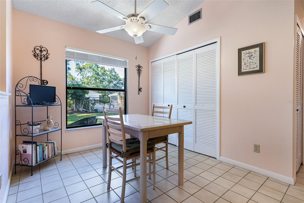 3041 Matecumbe Key Road, Unit 4 Punta Gorda, FL 33955 - Photo 10 of 33 a view of a dining room with furniture window and outside view