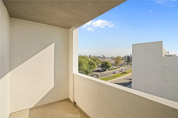 a view of a glass door with a balcony