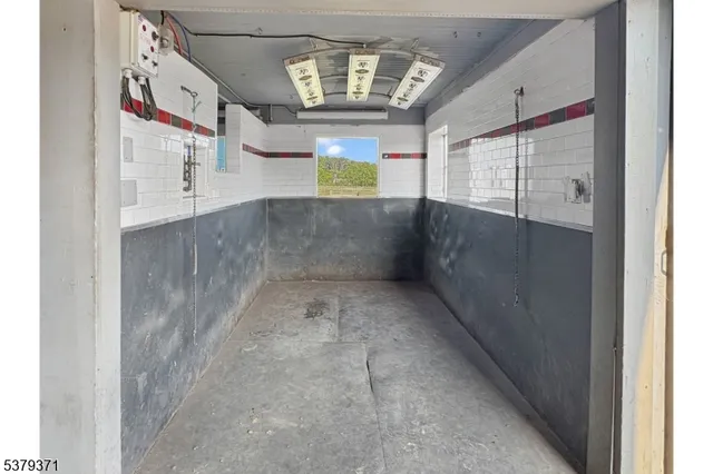 a view of an entryway with a window