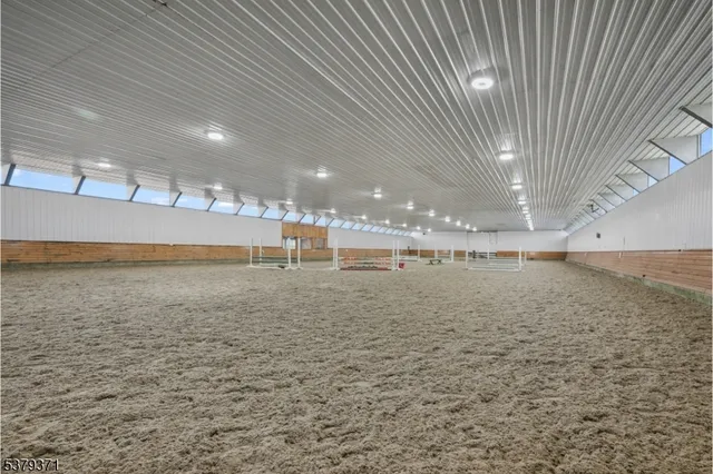 a view of a livingroom with kitchen