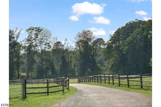 a view of a house with a big yard