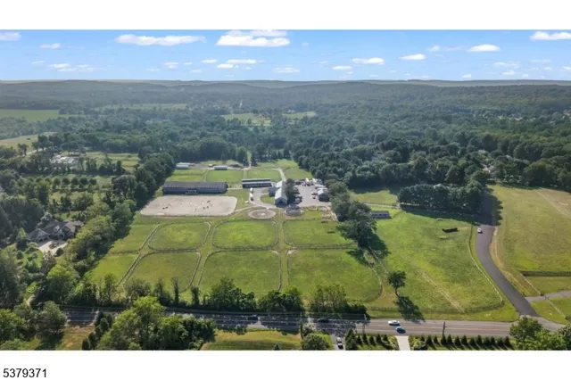 a view of a swimming pool with a yard