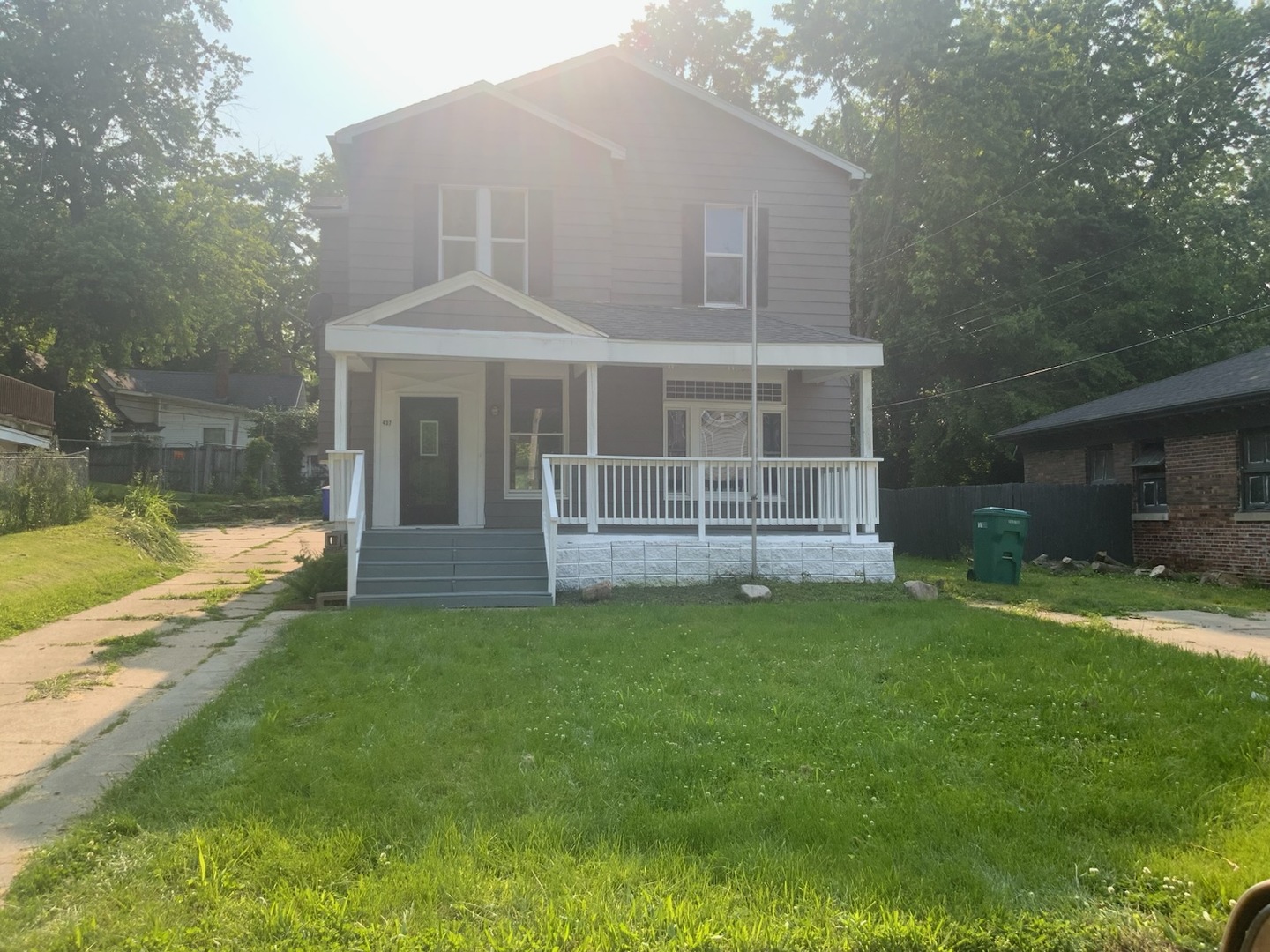 a view of a house with a garden