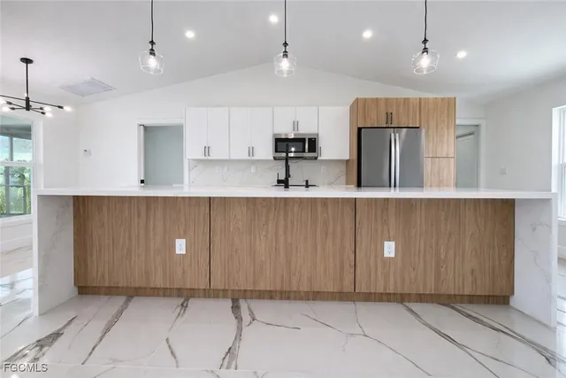 $1,945 | 3018 Northeast 1st Place, Cape Coral, FL 33909