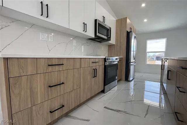 $1,945 | 3018 Northeast 1st Place, Cape Coral, FL 33909