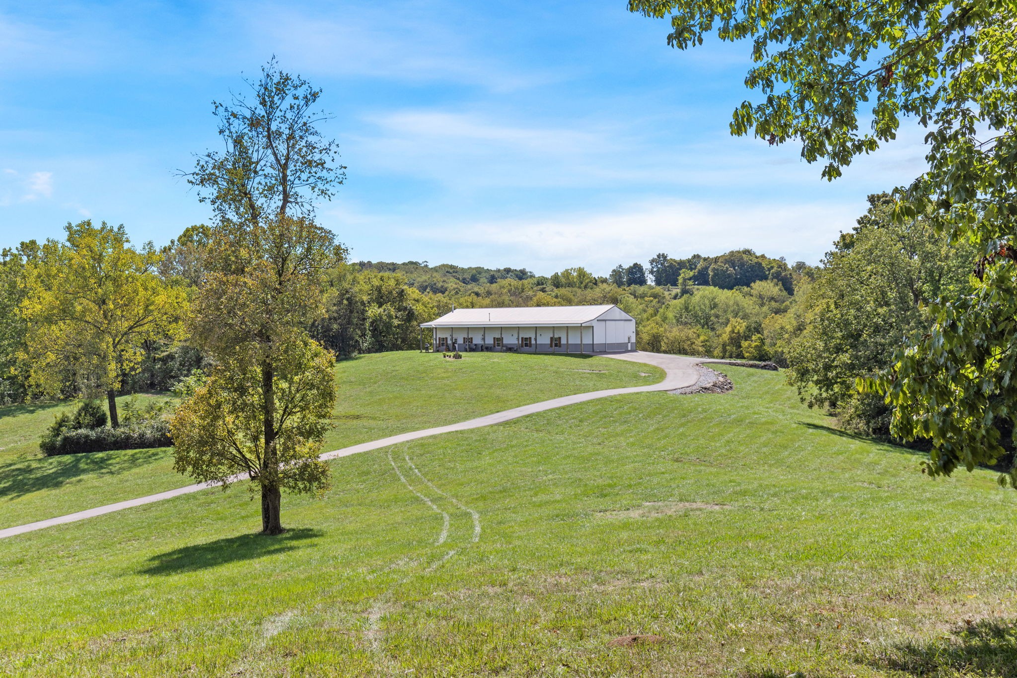 1818 Preacher Holt Road Mount Pleasant, TN 38474 - Photo 2 of 43 a view of an outdoor space and basketball court