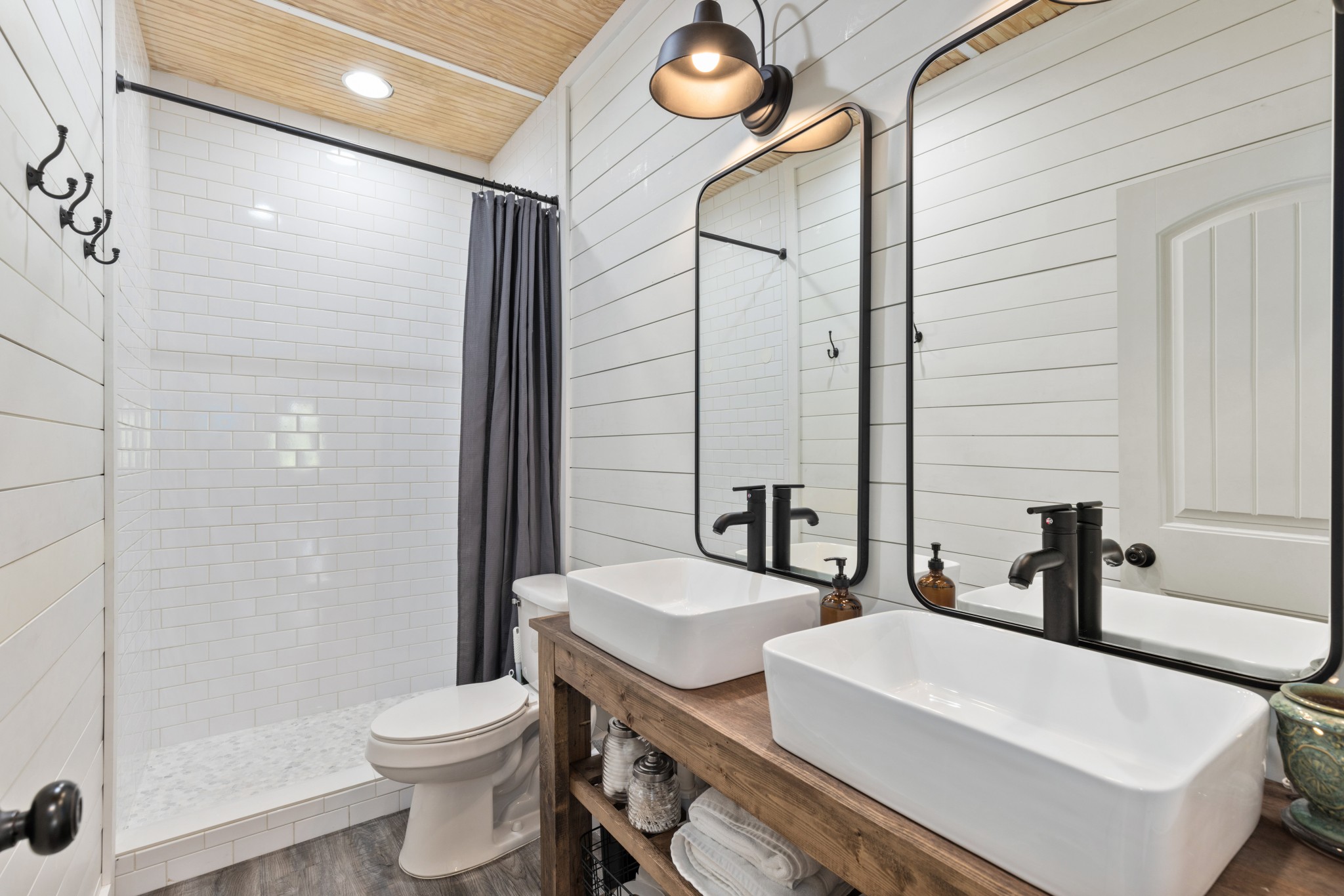 1818 Preacher Holt Road Mount Pleasant, TN 38474 - Photo 24 of 43 a bathroom with a sink a toilet and shower