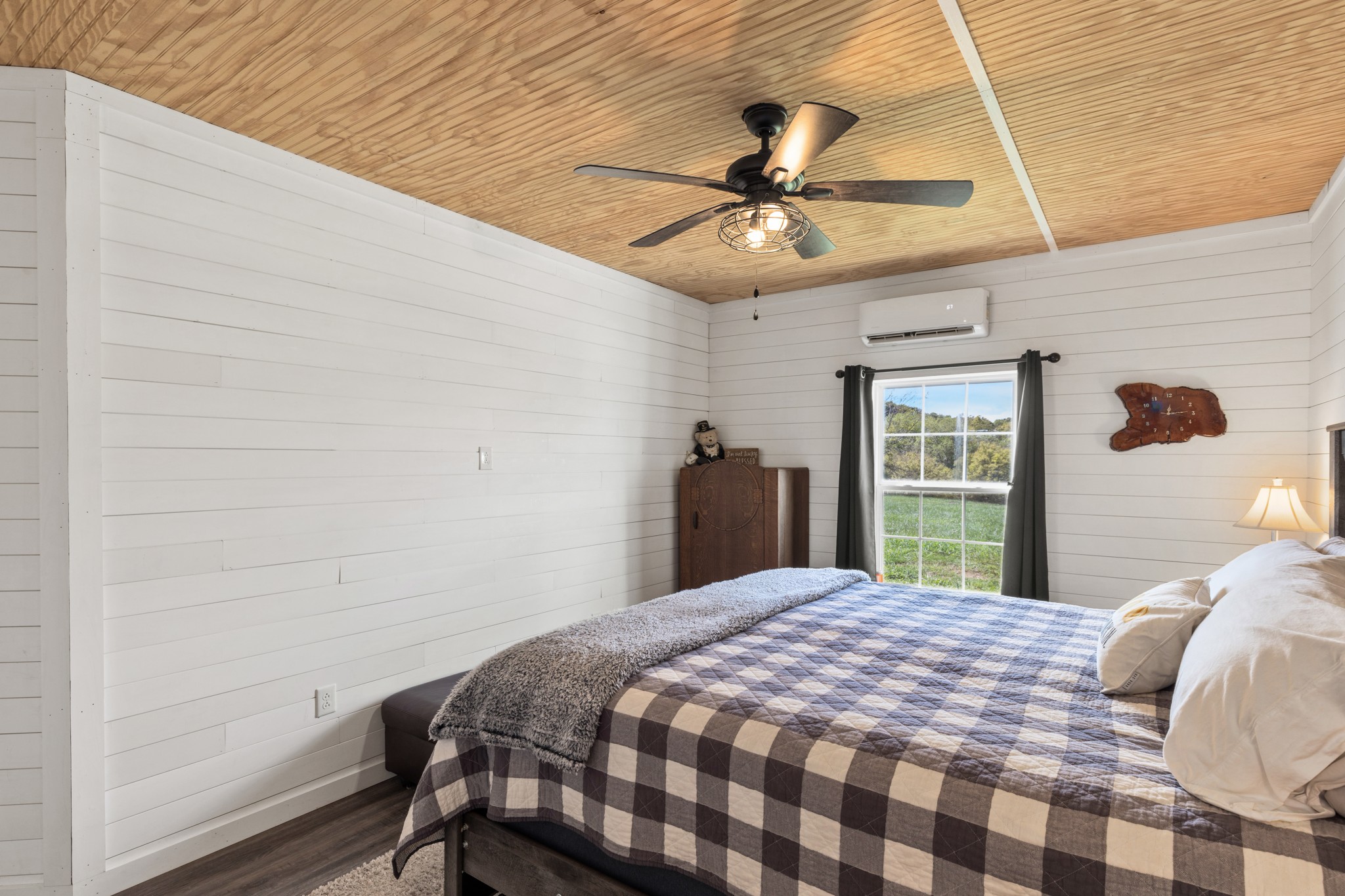 1818 Preacher Holt Road Mount Pleasant, TN 38474 - Photo 26 of 43 a bedroom with a bed and a window