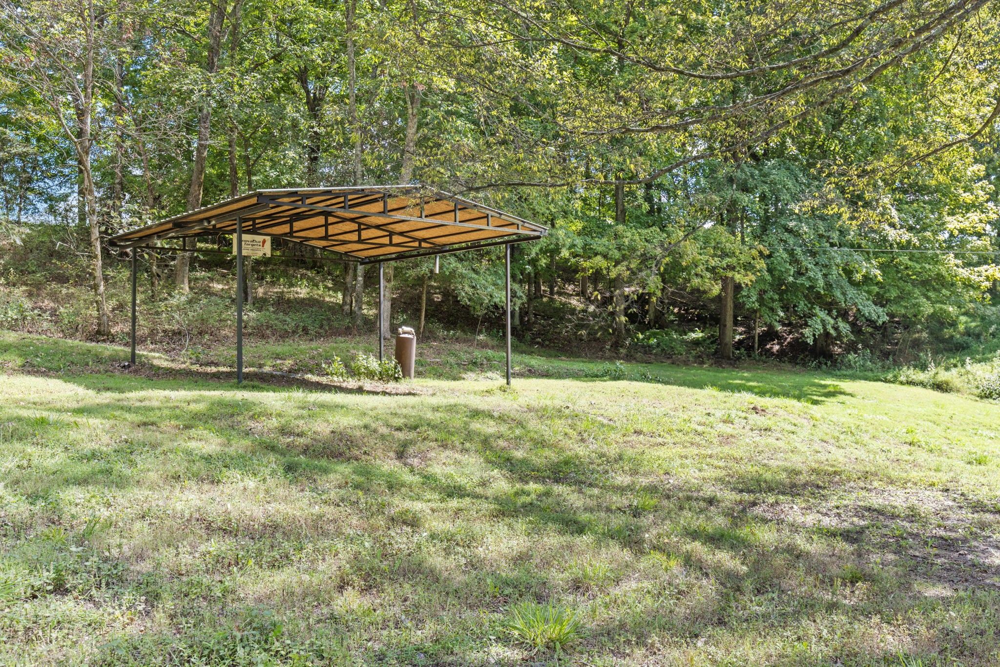 1818 Preacher Holt Road Mount Pleasant, TN 38474 - Photo 39 of 43 a backyard of a house with lots of green space
