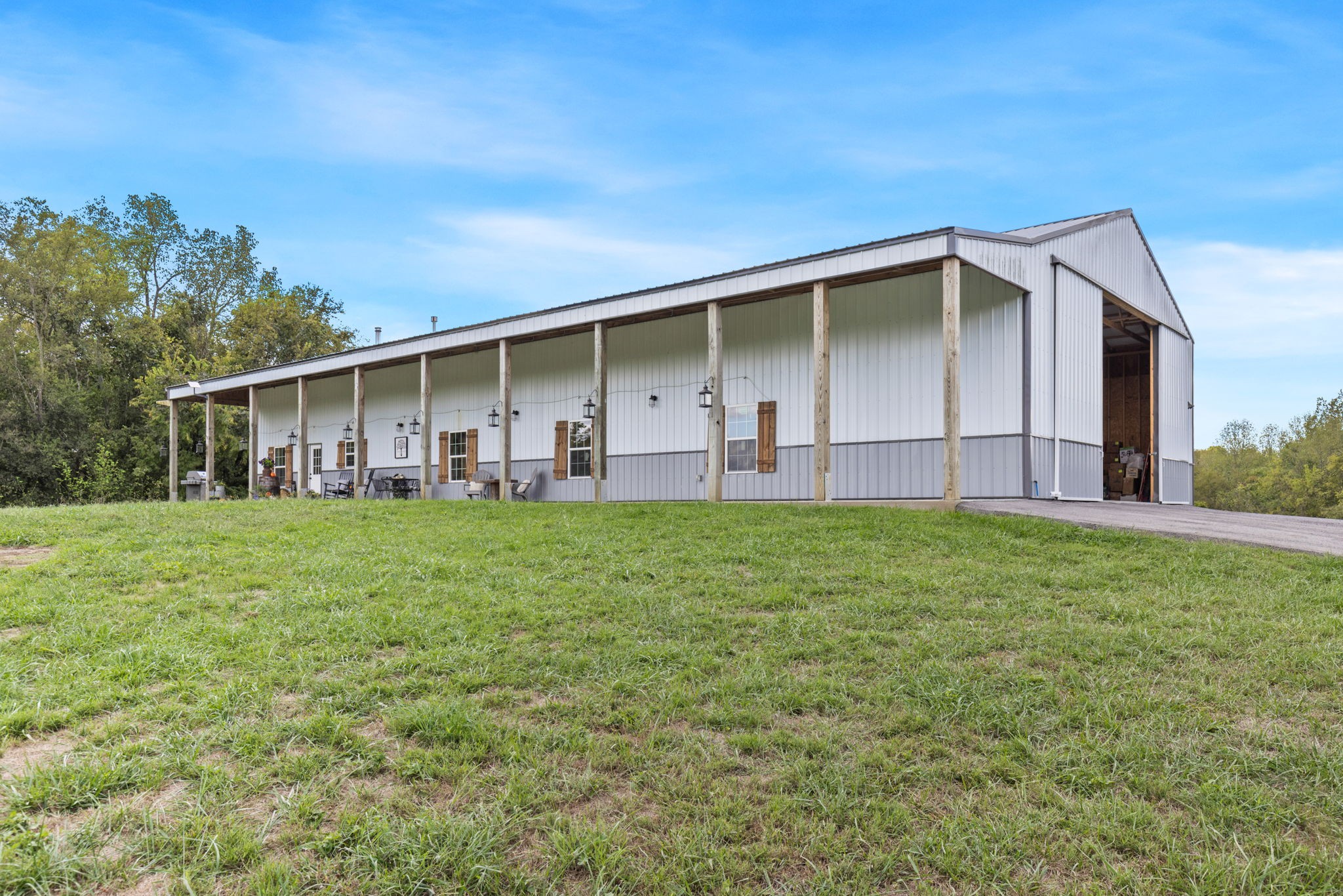 1818 Preacher Holt Road Mount Pleasant, TN 38474 - Photo 8 of 43 a view of an house with backyard space and balcony