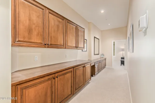 a view of a livingroom with furniture and a window