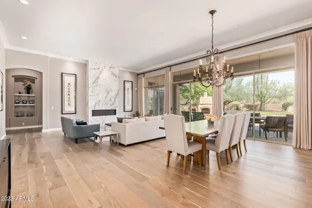 a bathroom with a toilet a sink and a mirror