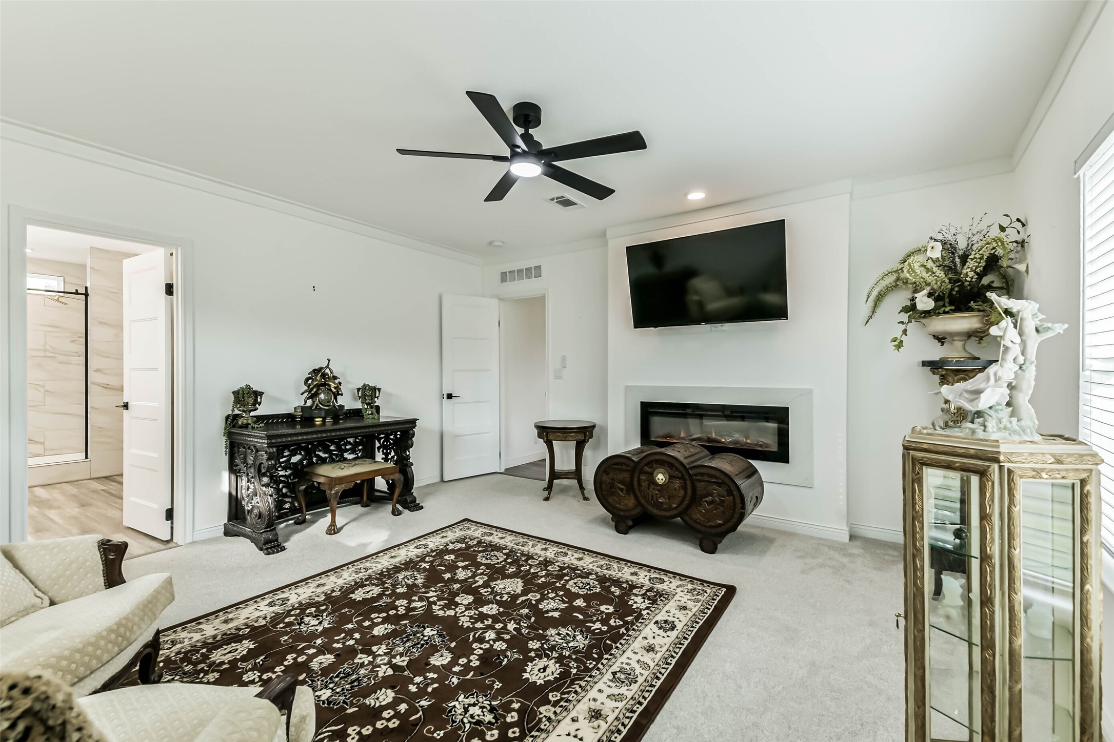 17700 Fregia Road Hull, TX 77564 - Photo 14 of 42 Master bedroom includes electric ambient lit fireplace