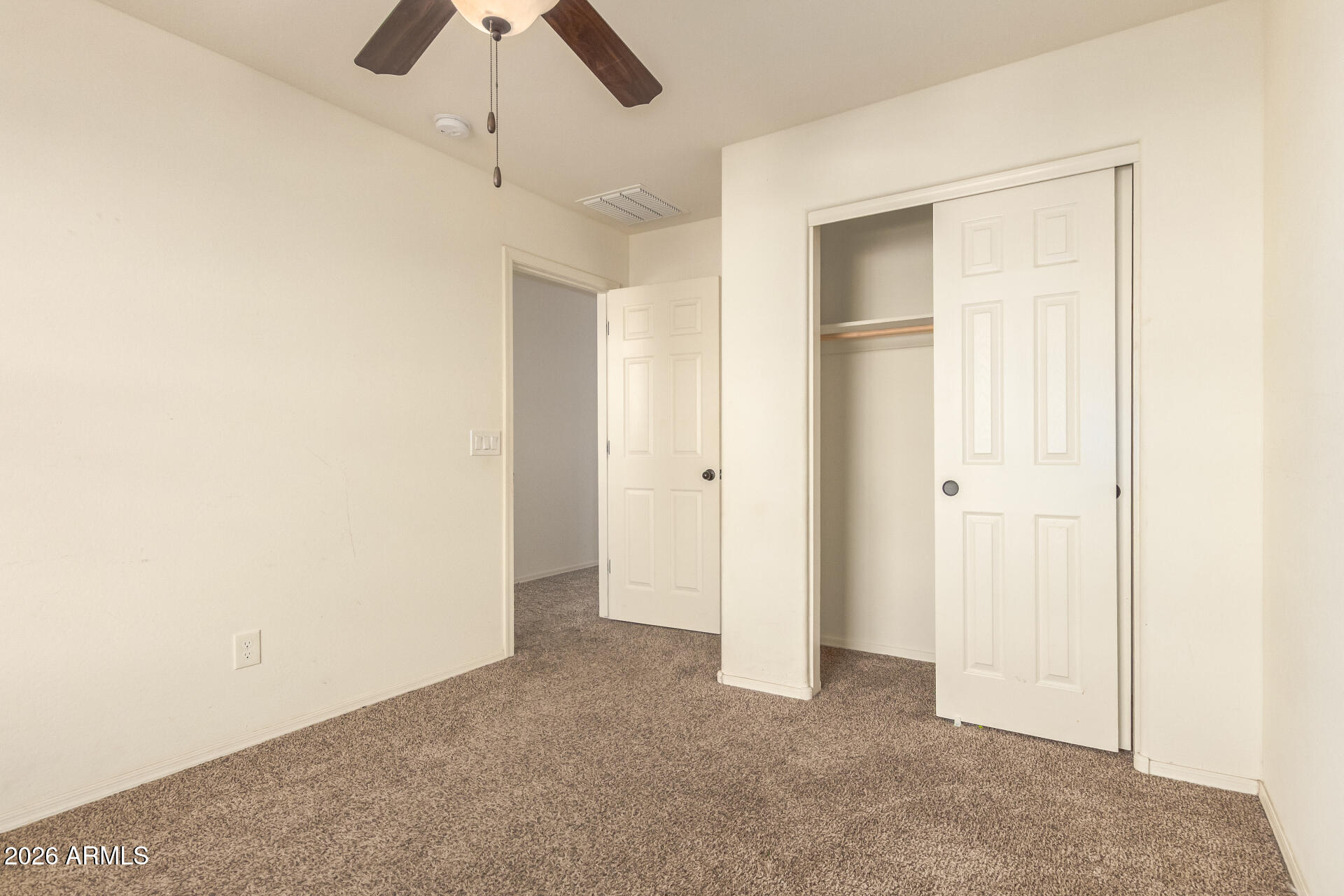 6203 West Evergreen Road Glendale, AZ 85302 - Photo 29 of 32 a view of empty room with a ceiling fan