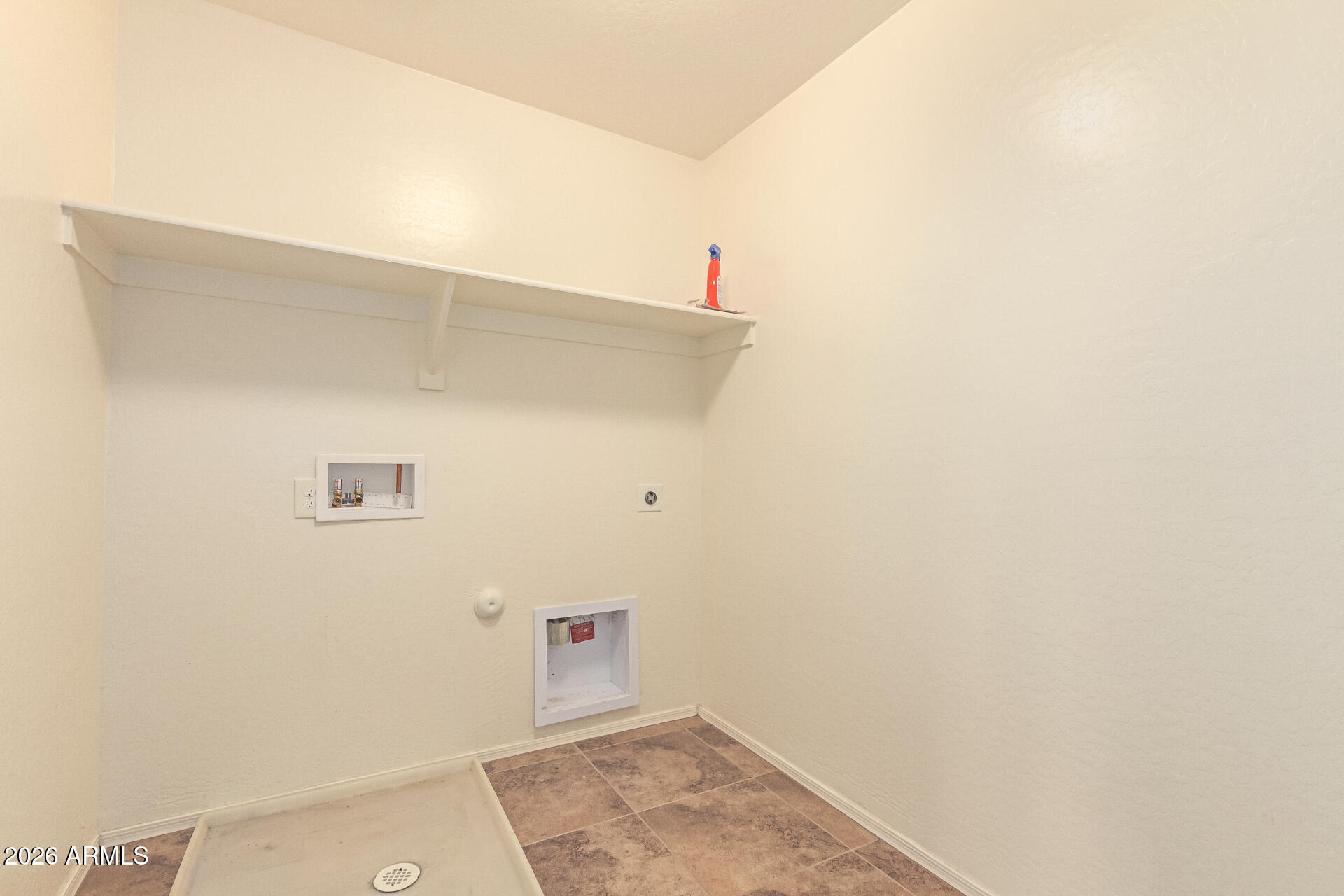 6203 West Evergreen Road Glendale, AZ 85302 - Photo 31 of 32 a bathroom with a sink