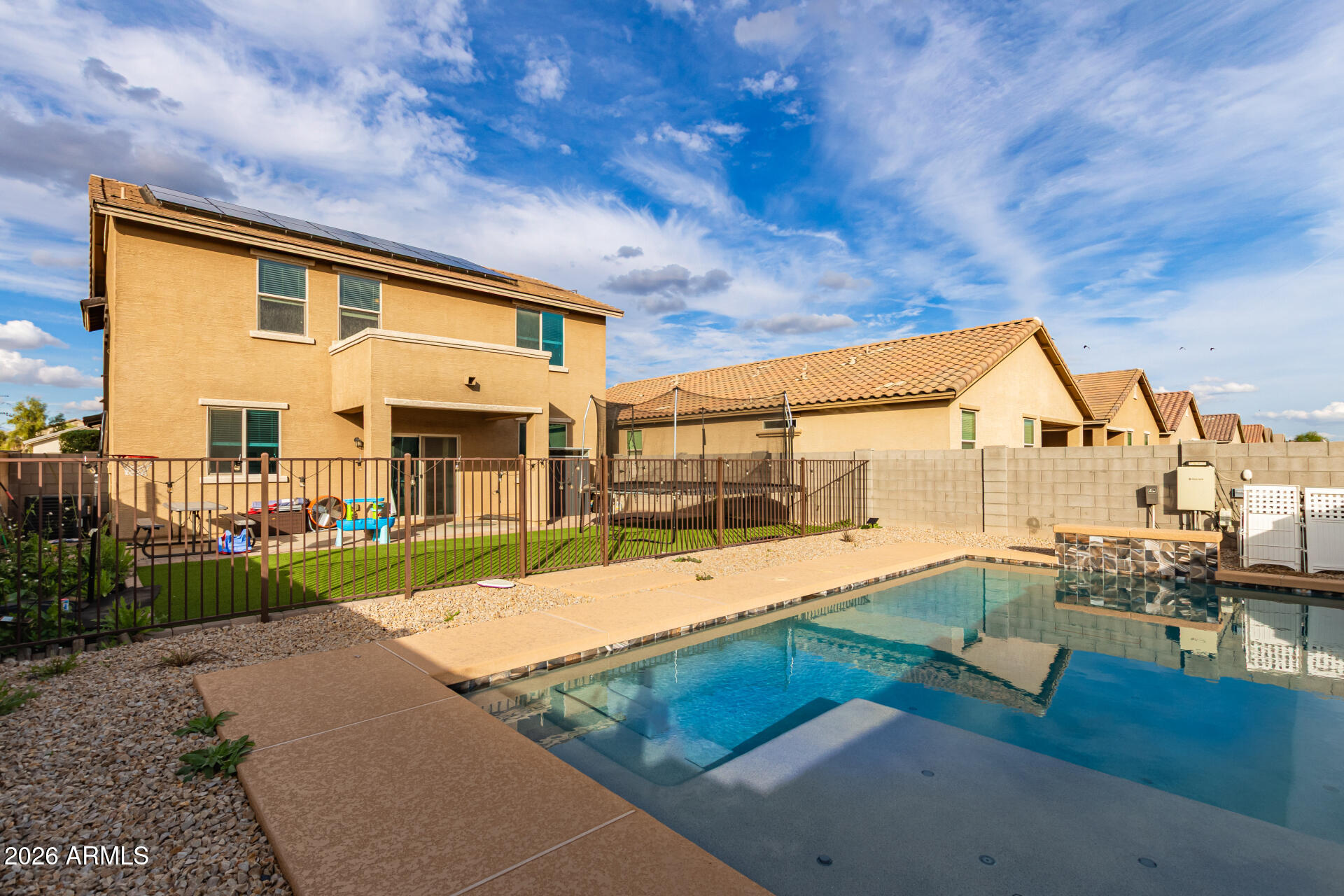 6203 West Evergreen Road Glendale, AZ 85302 - Photo 4 of 32 a view of a house with a patio