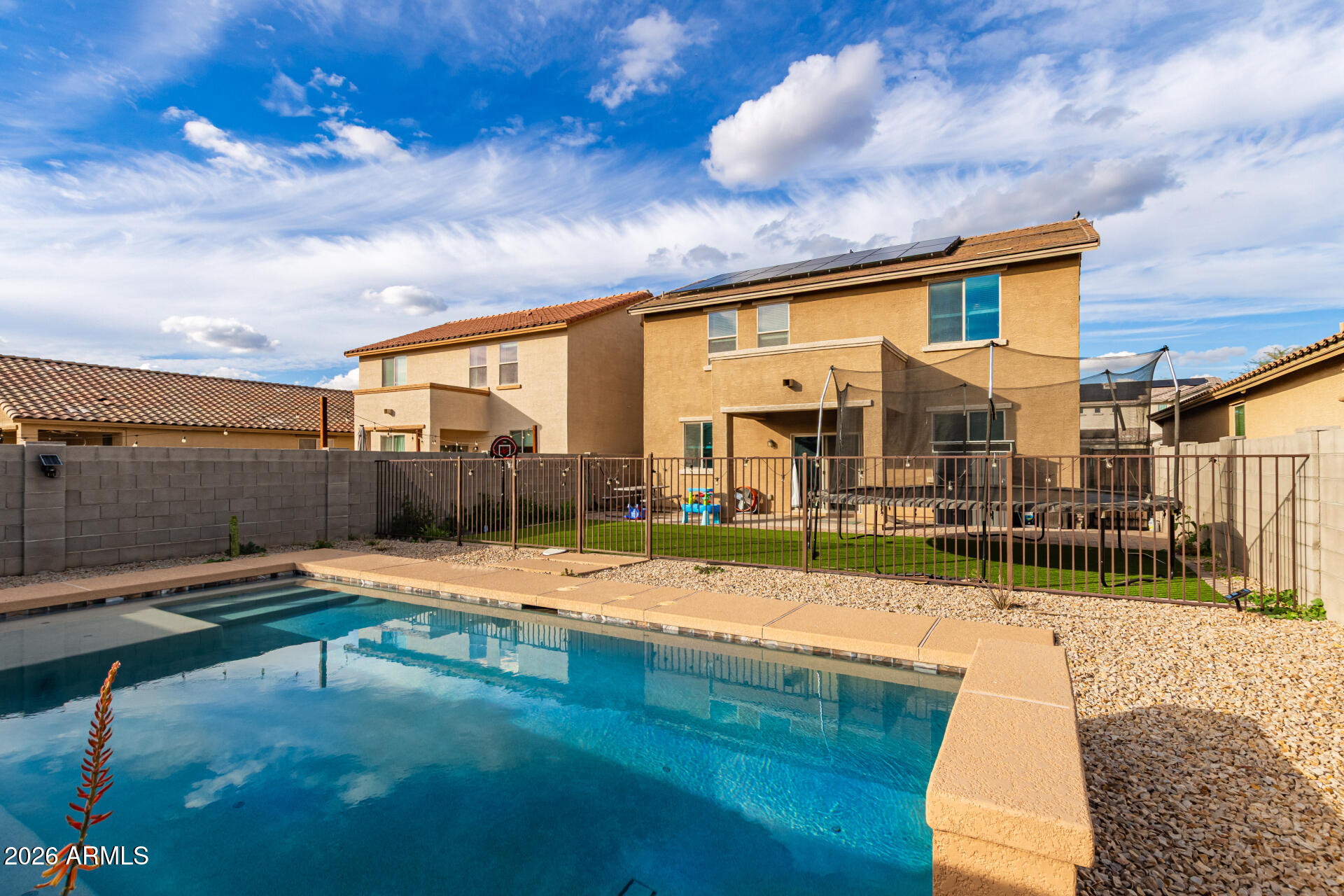 6203 West Evergreen Road Glendale, AZ 85302 - Photo 5 of 32 a view of a patio with a table and chairs