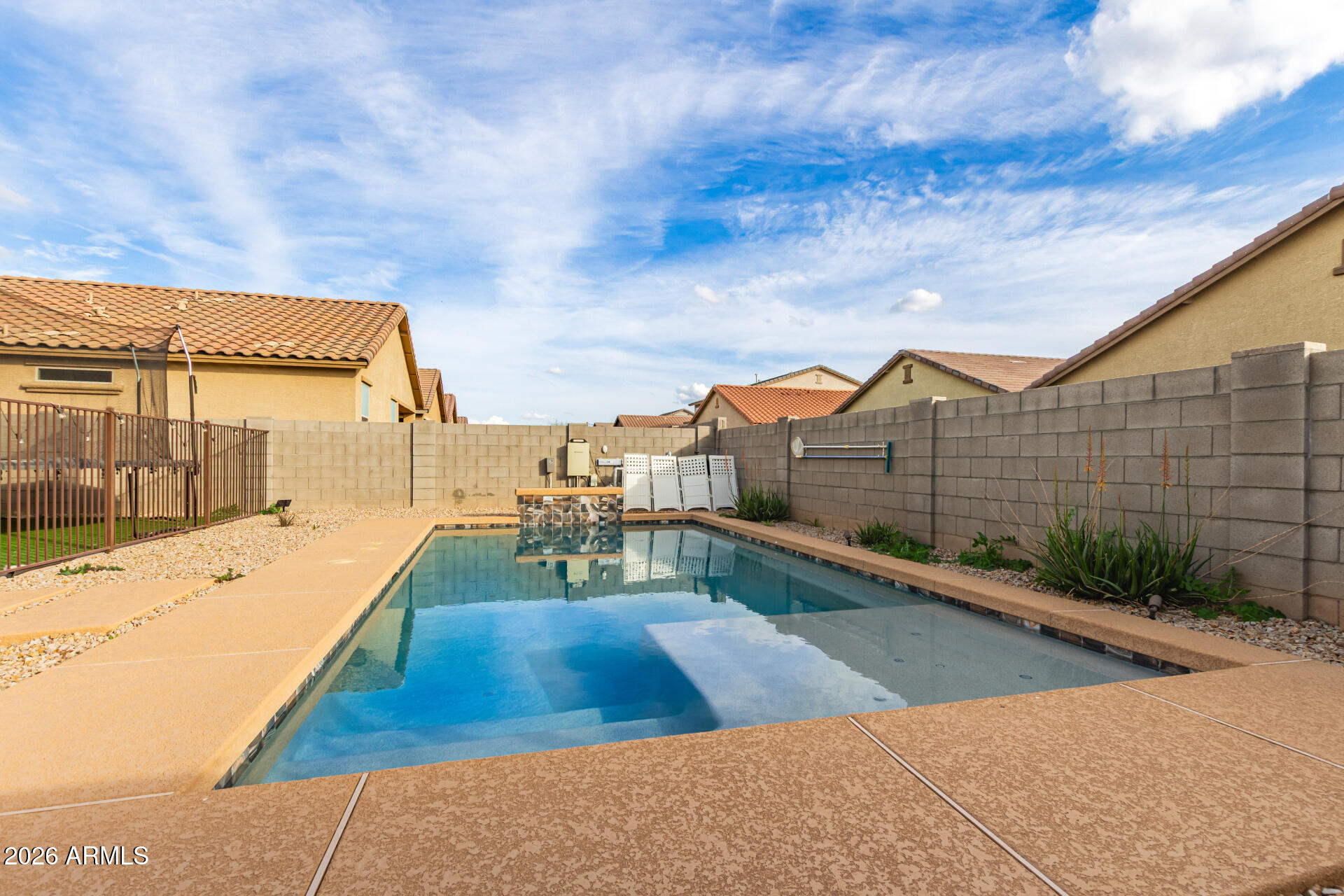 6203 West Evergreen Road Glendale, AZ 85302 - Photo 6 of 32 a view of swimming pool with a lounge chair