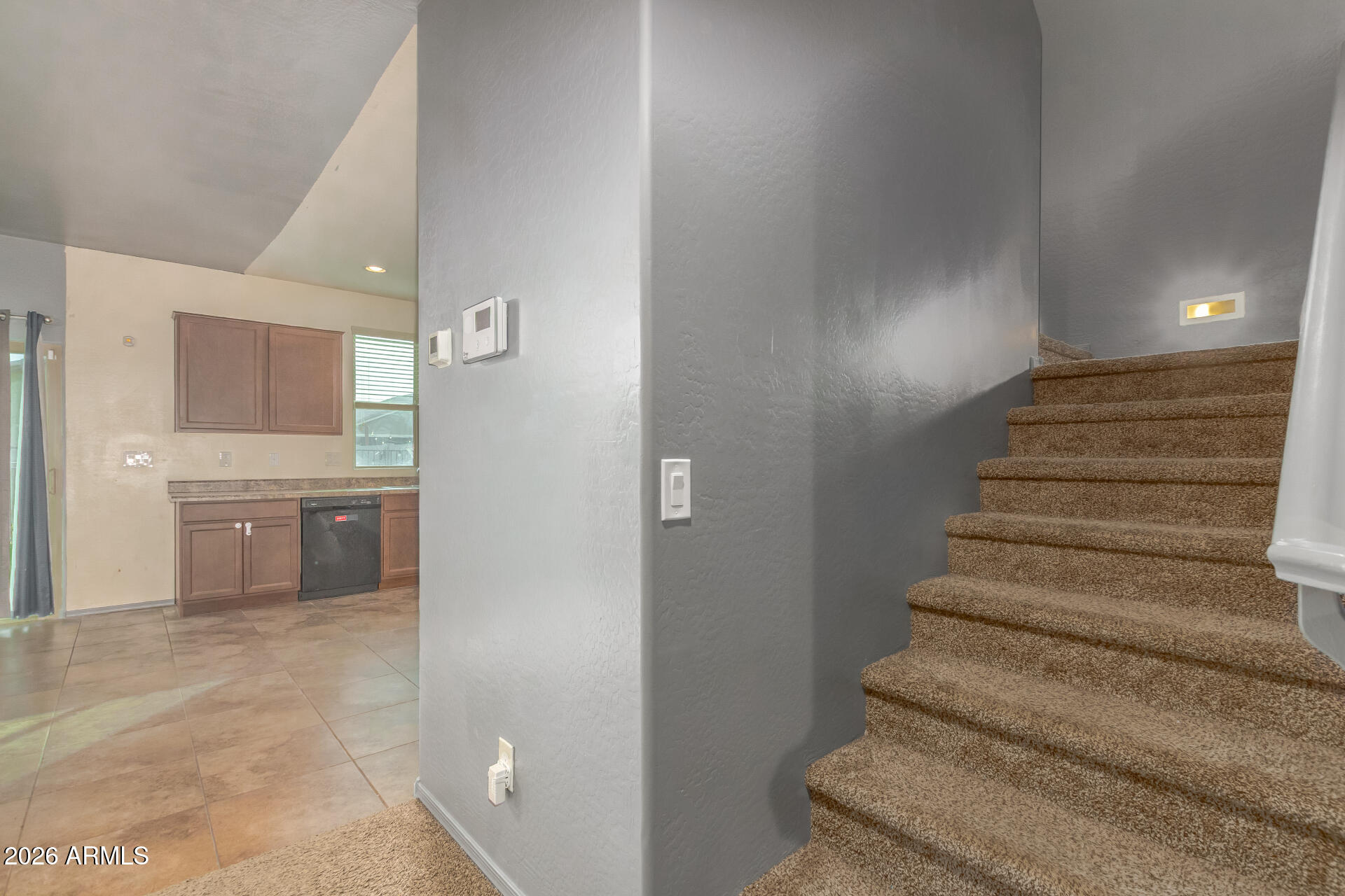 6203 West Evergreen Road Glendale, AZ 85302 - Photo 9 of 32 a view of entryway and kitchen