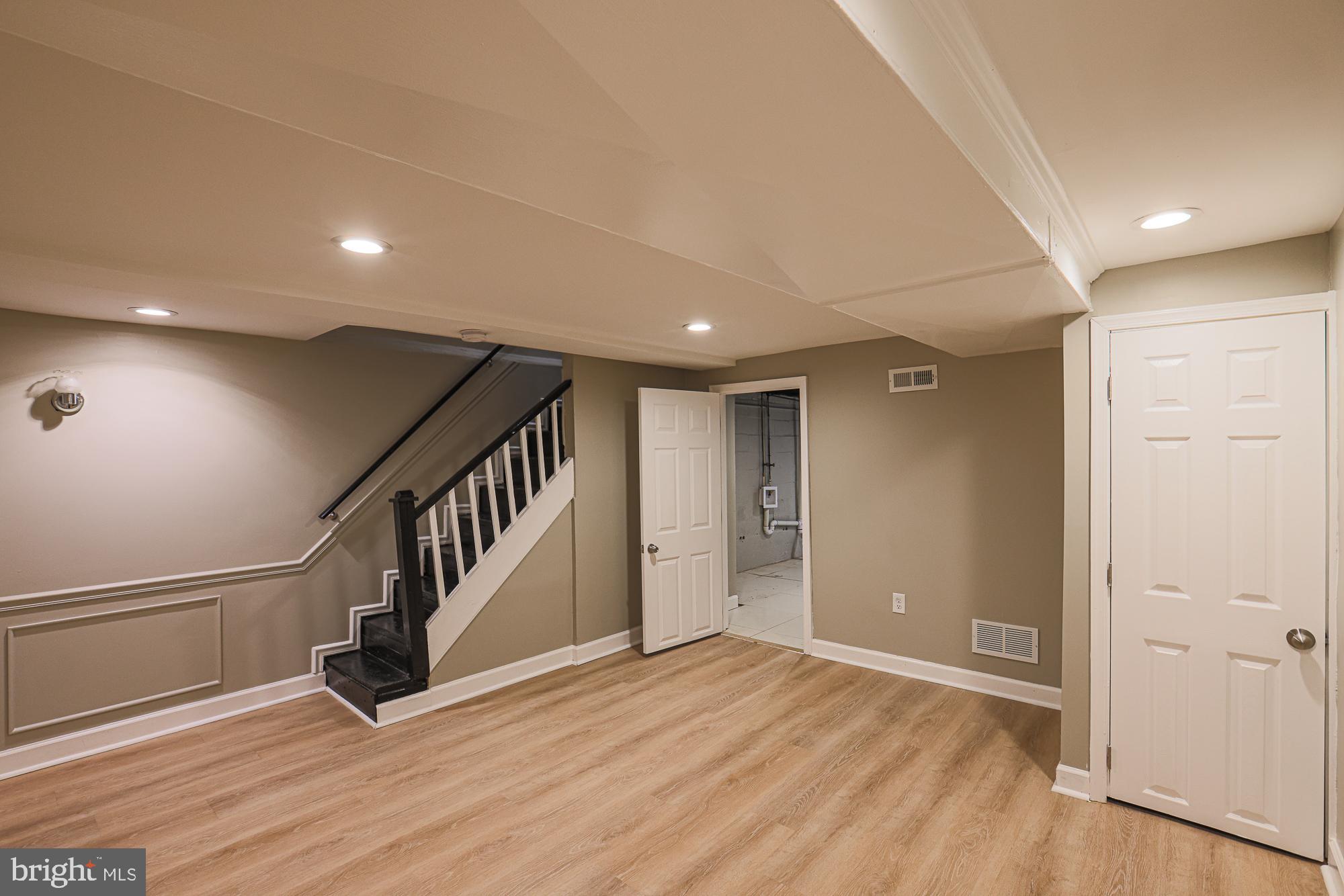 2454 Terra Firma Road Baltimore, MD 21225 - Photo 31 of 44 a view of an entryway with wooden floor