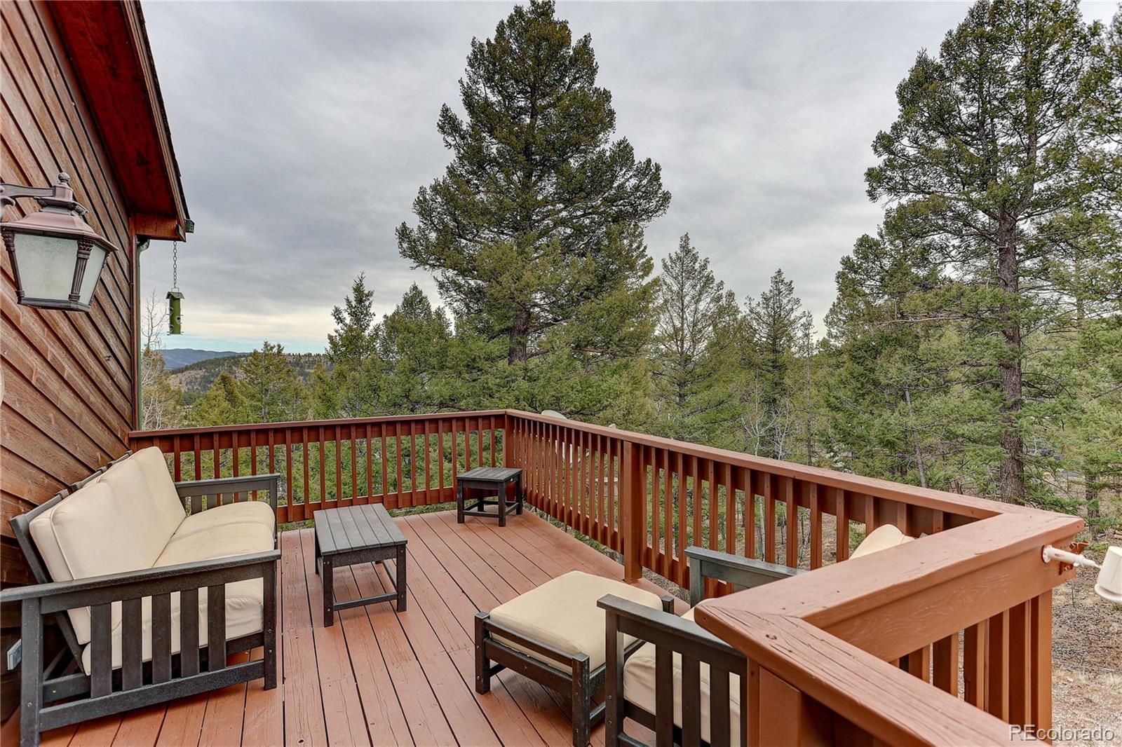 261 Mt Bailey Drive Bailey, CO 80421 - Photo 3 of 28 a view of balcony with furniture