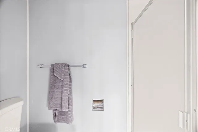 a view of entryway with wooden stairs