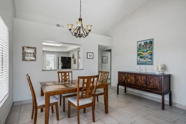 a view of a dining room with furniture