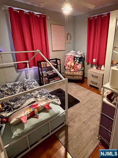 15 Hackensack Street East Rutherford, NJ 07073 - Photo 13 of 26 a bedroom with bed and a mirror