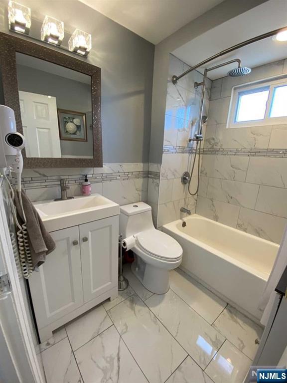 15 Hackensack Street East Rutherford, NJ 07073 - Photo 14 of 26 a bathroom with a sink toilet and shower