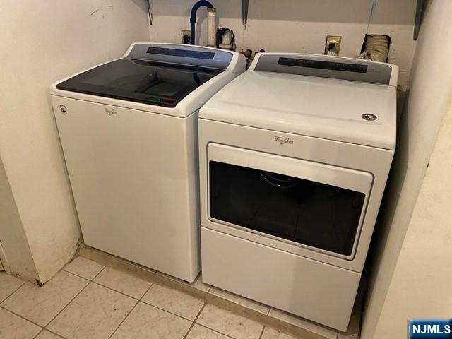 15 Hackensack Street East Rutherford, NJ 07073 - Photo 19 of 26 a close up view of washer and dryer