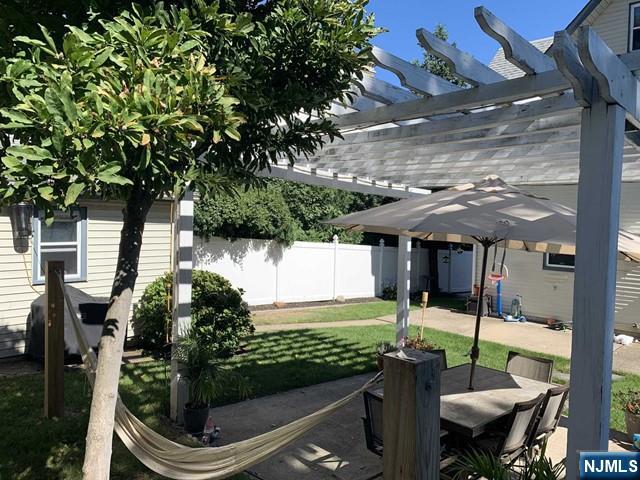 15 Hackensack Street East Rutherford, NJ 07073 - Photo 22 of 26 a front view of a house with garden