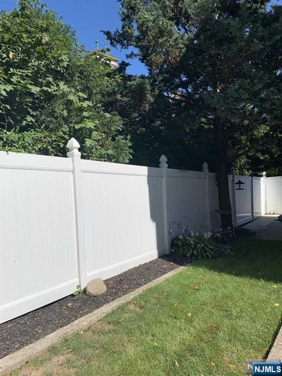 15 Hackensack Street East Rutherford, NJ 07073 - Photo 23 of 26 a backyard of a house with lots of green space