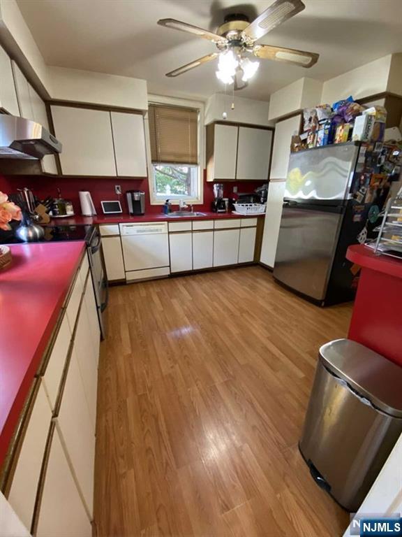 15 Hackensack Street East Rutherford, NJ 07073 - Photo 6 of 26 a view of a room with kitchen and dining room view