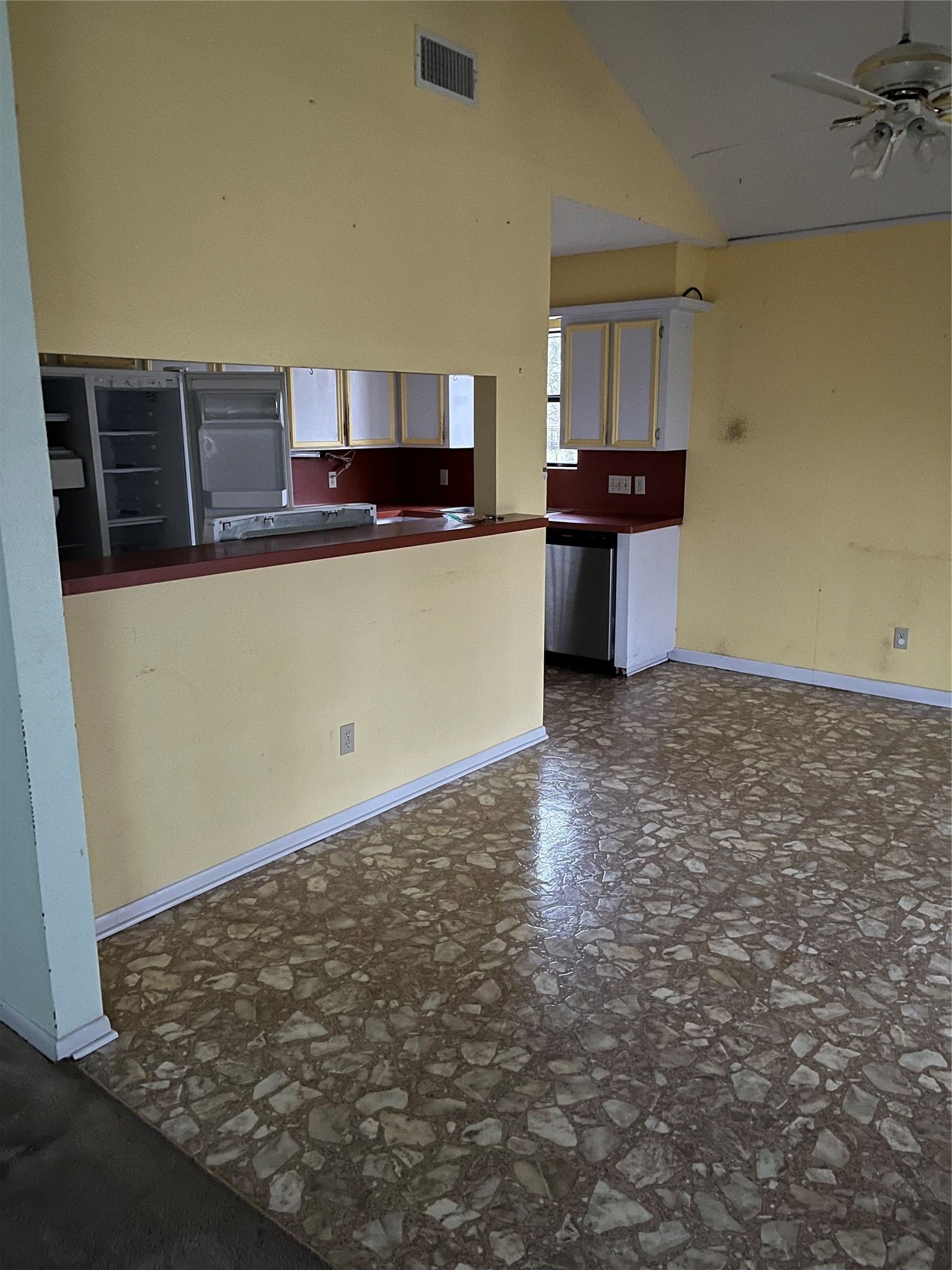 12022 Annette Road, Unit CR657 Angleton, TX 77515 - Photo 25 of 26 a kitchen with granite countertop a sink and a stove top oven