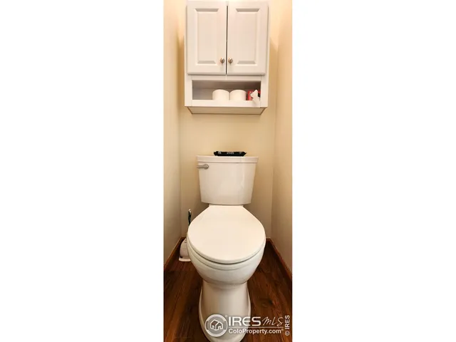 a bathroom with a toilet and a sink