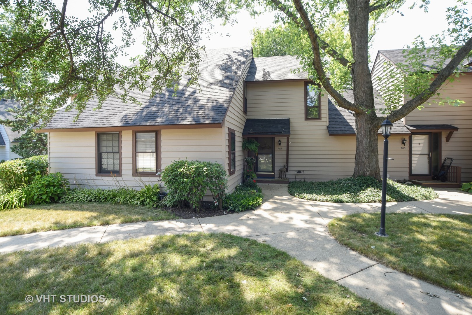 702 Chandler Road Gurnee, IL 60031 - Photo 15 of 26 a view of a house with a yard