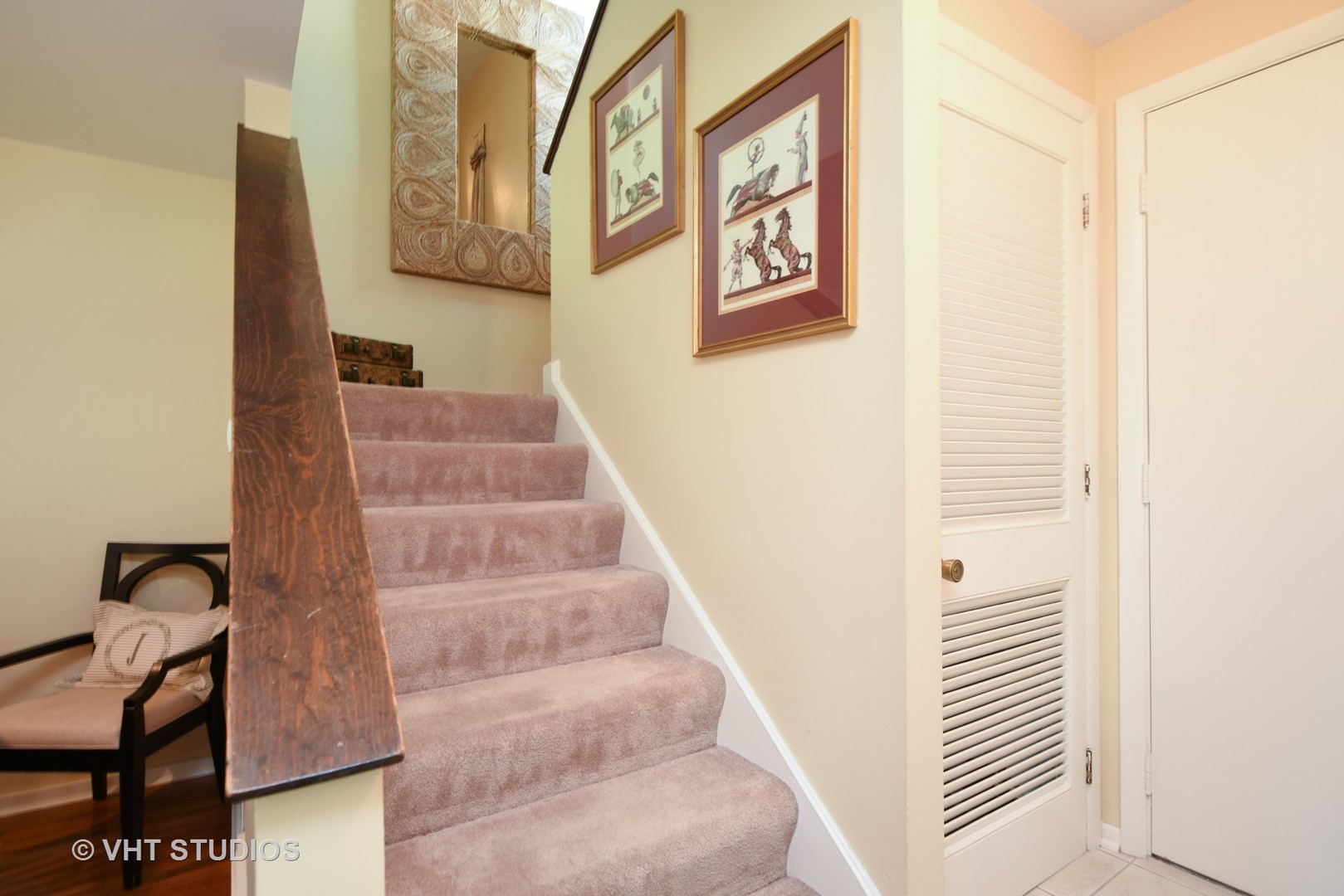 702 Chandler Road Gurnee, IL 60031 - Photo 6 of 26 a view of staircase with black and white walls