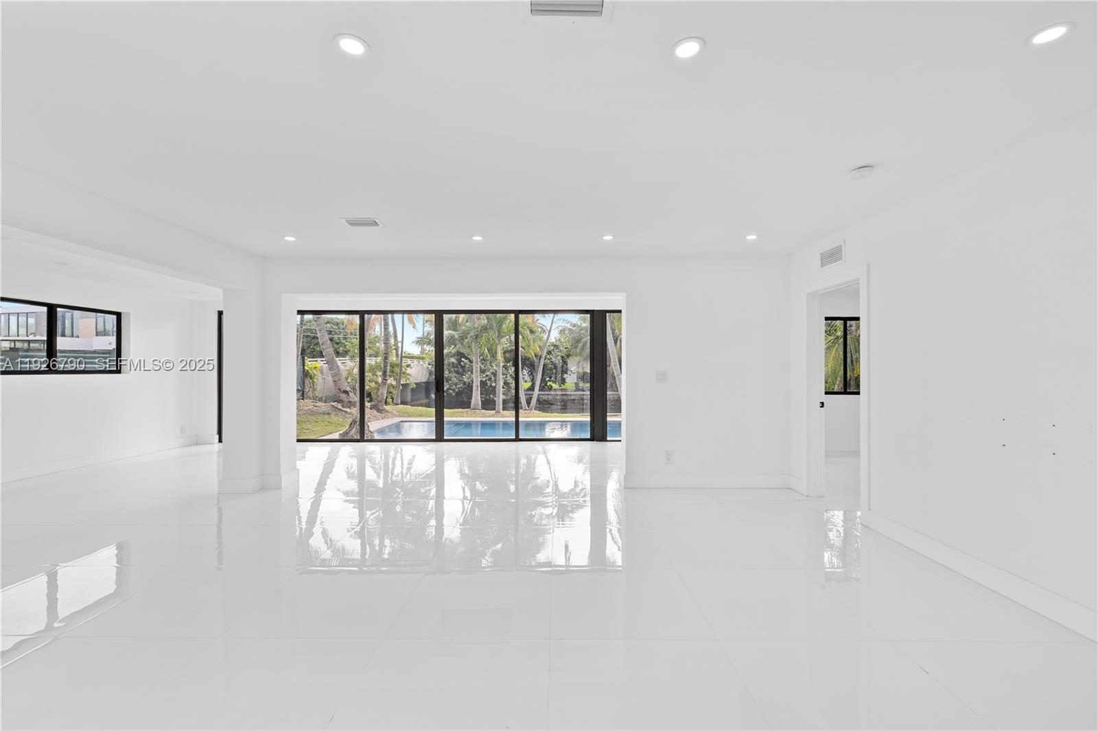 1200 Cleveland Road Miami Beach, FL 33141 - Photo 33 of 41 a view of an empty room with a window