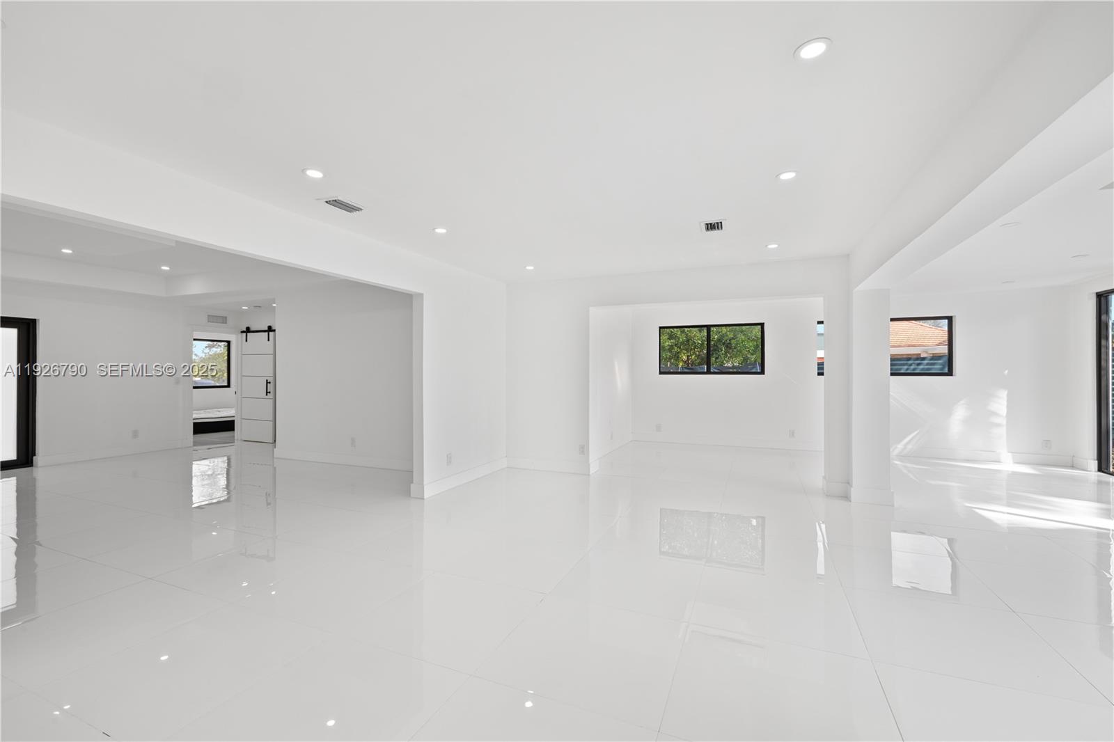 1200 Cleveland Road Miami Beach, FL 33141 - Photo 34 of 41 a view of a kitchen with refrigerator and a stove top oven