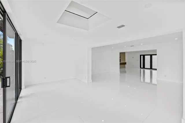 a view of swimming pool with sitting area