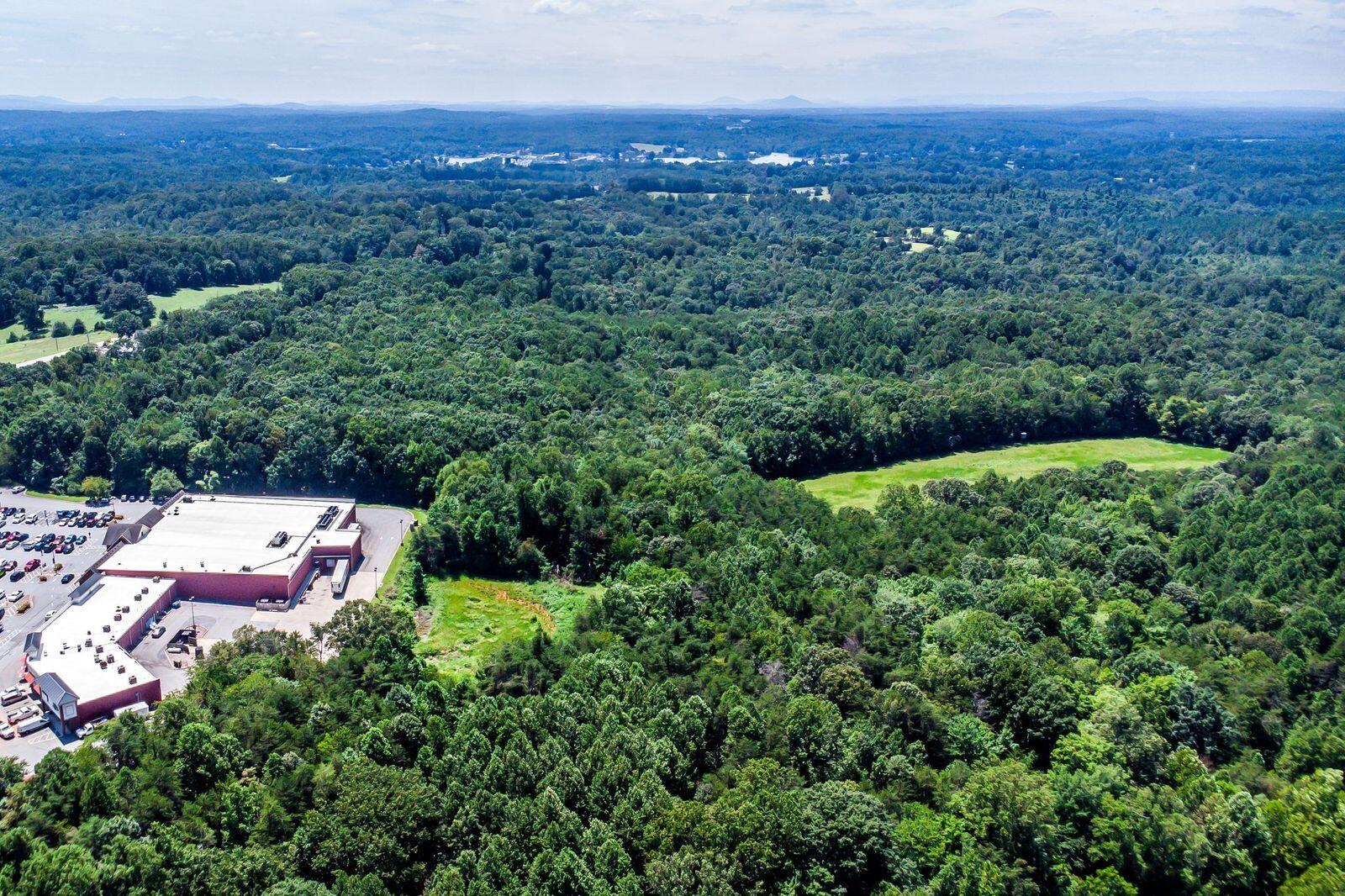 3-15093 Moneta Road Moneta, VA 24121 - Photo 2 of 13 an aerial view of residential house with outdoor space and trees all around